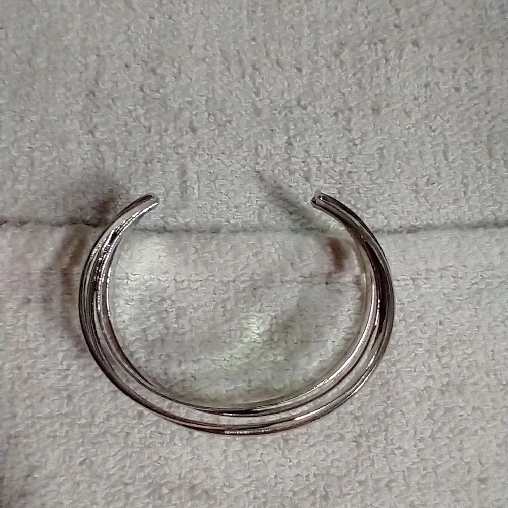 Silvertone wide cuff bracelet